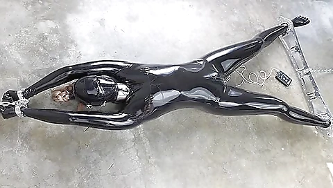 Rubber-bound Girl In Electro Play