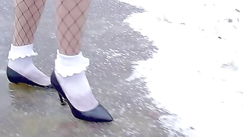 High Heels And White Frilly Socks In The Snow