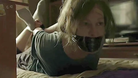 Mature Woman Hog Taped And Tape Gagged